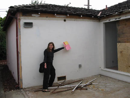 Alison shows off the permit! Note the small remaining section of glass in the corner