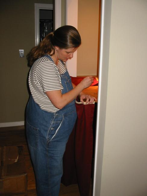 Alison works on the drape